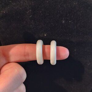 Small white Trifari hoop clip on earrings